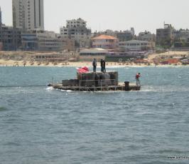 بالصور : نجاح تجربة عبارات غزية لنقل مساعدات أسطول الحرية