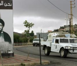 بالصور : صور الرئيس الإيراني محمود احمدي نجاد تُزين الجنوب اللبناني