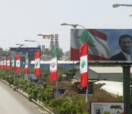 بالصور : صور الرئيس الإيراني محمود احمدي نجاد تُزين الجنوب اللبناني