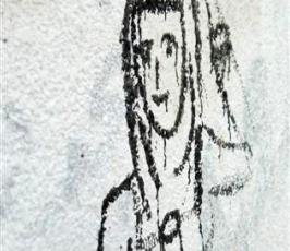 بالصور:: شباب غزيون يرسمون على جدران غزة بيوم التراث الفلسطينى