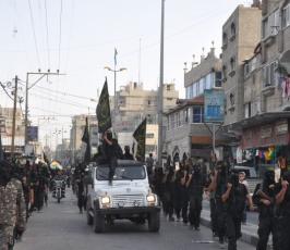 بالصور :سرايا القدس تنظم عرضاً عسكرياً في مدينتي رفح وخانيونس