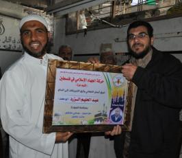 بالصور: حركة الجهاد تستقبل حجاج بيت الله الحرام بغزة