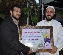 بالصور: حركة الجهاد تستقبل حجاج بيت الله الحرام بغزة