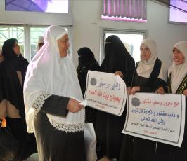  « sos »بالصور: العمل النسائي للجهاد الاسلامي يستقبل الحجاج على معبر رفح ويزور قرية الايتام