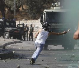 شاهد بالصور:الاشتباكات بين الفلسطينيين والاسرائليين بحى سلوان