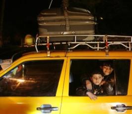 بالصور:دخول 250 عالق من الجانب المصري إلى قطاع غزة