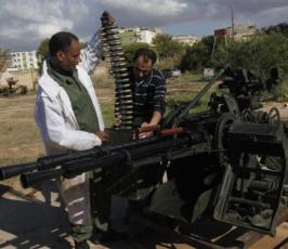 بالصور : ثوار ليبيا يتمركزون على مداخل المدن لحماية المناطق المحررة