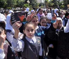بالصور: مسيرة لأطفال غزة بساحة الجندى المجهول يدعون الى انهاء الانقسام
