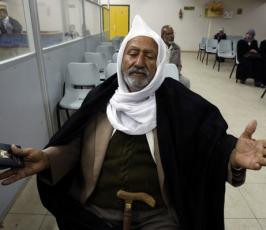 بالصور : فلسطينيون عائدون من ليبيا يتحدثون عن جرائم نظام « القذافي »