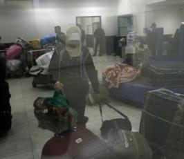 بالصور : فلسطينيون عائدون من ليبيا يتحدثون عن جرائم نظام « القذافي »
