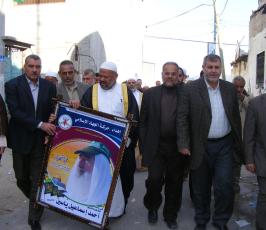 بالصور.. لجنة التواصل الجماهيري تزور منزل الشهيد أحمد ياسين