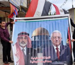 بالصور: فلسطينيون يعبرون عن فرحتهم بانهاء الانقسام بالصور والمجسمات