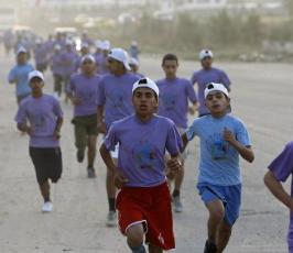 بالصور:: الوكالة تنظم ماراثون الجري في قطاع غزة