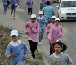 بالصور:: الوكالة تنظم ماراثون الجري في قطاع غزة