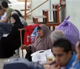 بالصور: المسافرون عبر  معبر رفح بعد تشغيله بشكل دائم