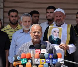 بالصور: وقفة تضامنية لحركة الجهاد تضامناً مع الشيخ رائد صلاح