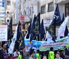 بالصور: فصائل المقاومة تخرج بمسيرة جماهيرية بيوم القدس العالمى