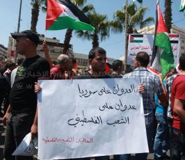 فلسطينيون يتضامنون مع "مصر وسوريا" وسط رام الله