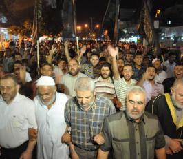 بالصور: الألاف من أنصار الجهاد يشاركون بمسيرة تضامنية مع الأسرى بسجون الإحتلال بغزة