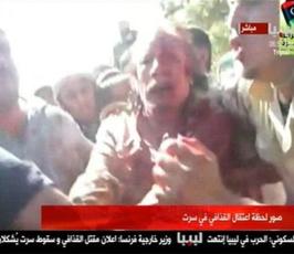 بالصور .. اعتقال القذافي وقتله من قبل الثوار الليبيين