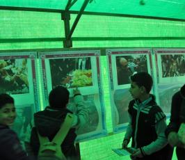 بالصور..الرابطة الإسلامية تنظم معرضاً للصور في ذكرى العدوان على غزة