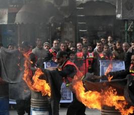 بالصور: الدفاع المدنى الفلسطينى بعرض له بالذكرى الثالثة للحرب على غزة