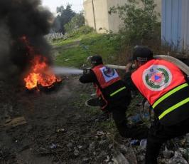 بالصور: الدفاع المدنى الفلسطينى بعرض له بالذكرى الثالثة للحرب على غزة