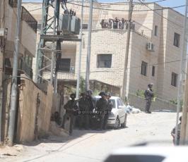 بالصوراصابات في مواجهات مع قوات الاحتلال في كفر عقب شمال القدس المحتلة