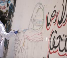 رسم جداريات  امام برج الجوهرة  الذي قصفه الاحتلال بغزة (7)