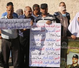 وقفة بغزة للمطابة باسترداد جثامين الشهداء المحتجزة لدى الاحتلال والكشف عن مصير المفقودين (2)