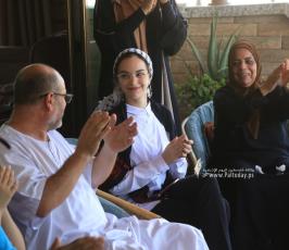 بالصورالطالبة منة الله مشعل حسن البطة الأولى على مستوى فلسطين القسم الأدبي بمعدل 99.7 %  من غزة (15)