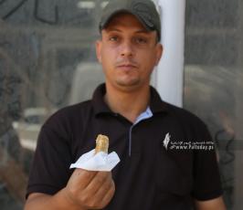 العمل النسائي في غزة توزع الحلوى على ابناء شعبنا ابتهاجًا  لعملية انتزاع الحرية من سجن جلبوع (14)