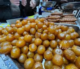  العوامة .. الحلوى الدافئة التي تُرافق شتاء الغزيين (6)