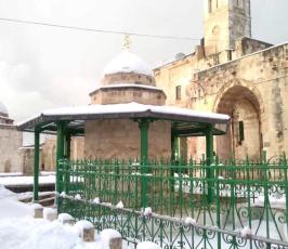 ثلوج تزين قبة الصخرة والمسجد الأقصى المبارك (13)