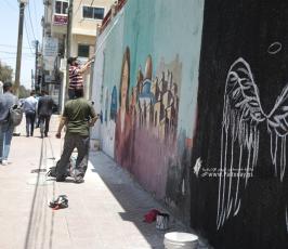 جدارية تخليداً لشهيدة الحقيقةشرين أبو عاقلة بميدان الصحافة بمدينة غزة  (11)