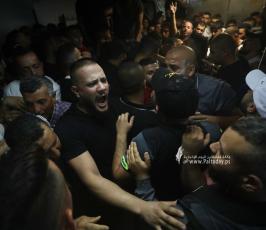  جثماني الشهيدين محمد بشار عزيزي (25 عاما) وعبد الرحمن جمال صبح (28 عاما) (5)