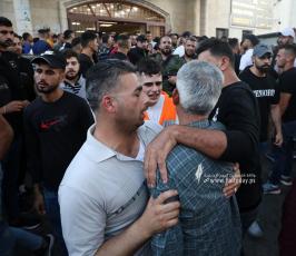  جثماني الشهيدين محمد بشار عزيزي (25 عاما) وعبد الرحمن جمال صبح (28 عاما) (1)