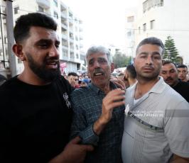  جثماني الشهيدين محمد بشار عزيزي (25 عاما) وعبد الرحمن جمال صبح (28 عاما) (10)
