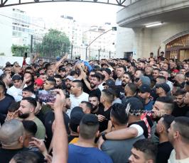  جثماني الشهيدين محمد بشار عزيزي (25 عاما) وعبد الرحمن جمال صبح (28 عاما) (9)