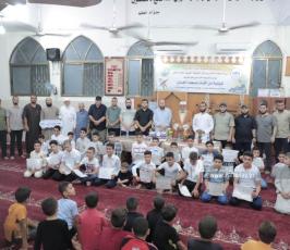 الجهاد وجمعية اقرأ بشرق غزة تكرم كوكبة من حفظة أجزاء من القرآن الكريم  فو (4)