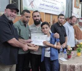 الجهاد وجمعية اقرأ بشرق غزة تكرم كوكبة من حفظة أجزاء من القرآن الكريم  فو (10)