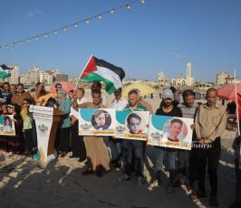  افتتاح أكبر منحوتة رملية في فلسطين بطول 100 متر تتضمن أسماء الشهداء الأطفال في معركة وحدة الساحات (10)