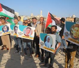  افتتاح أكبر منحوتة رملية في فلسطين بطول 100 متر تتضمن أسماء الشهداء الأطفال في معركة وحدة الساحات (9)