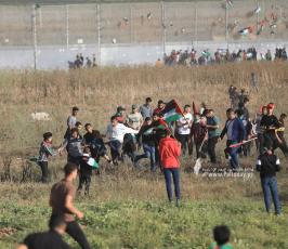 الاحتلال يقمع مسيرة العلم الفلسطيني شرق مدينة غزة (18)