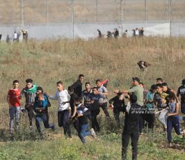 الاحتلال يقمع مسيرة العلم الفلسطيني شرق مدينة غزة (19)