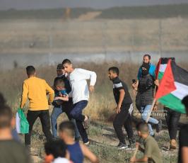 الاحتلال يقمع مسيرة العلم الفلسطيني شرق مدينة غزة (20)