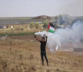 الاحتلال يقمع مسيرة العلم الفلسطيني شرق مدينة غزة (32)