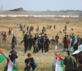 الاحتلال يقمع مسيرة العلم الفلسطيني شرق مدينة غزة (15)
