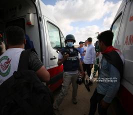 الطواقم الصحفية خلال  تغطية مسيرة العلم الفلسطيني شرق مدينة غزة (11)