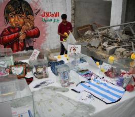 جداريات فنية رسمها فنانون من غزة على ركام المنازل التى دمرها الإحتلال في دير البلح (15)